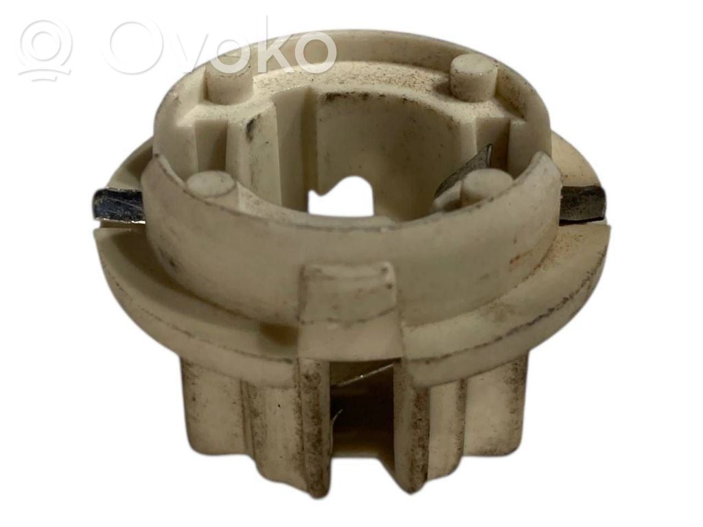 Aizmugures spuldzes vāka turētājs