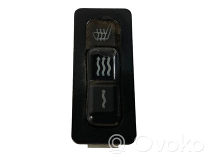 Sēdekļu apsildes slēdzis