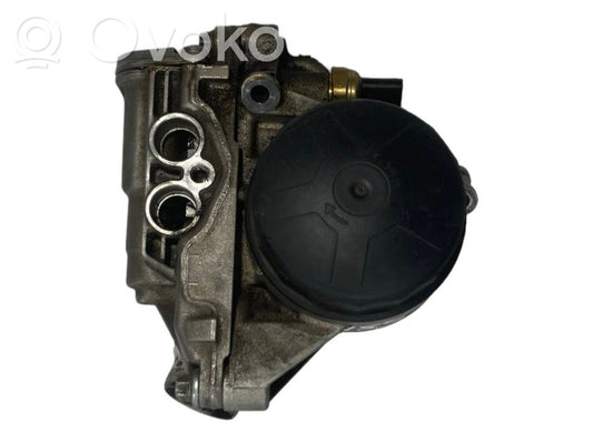 Oil filter holder/cooler