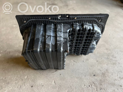 Trunk storage compartment