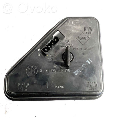 Aizmugures spuldzes vāka turētājs