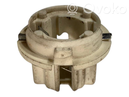 Aizmugures spuldzes vāka turētājs