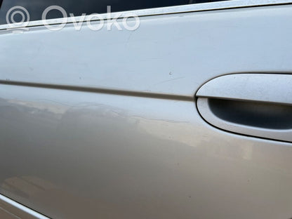 Aizmugurējās durvis