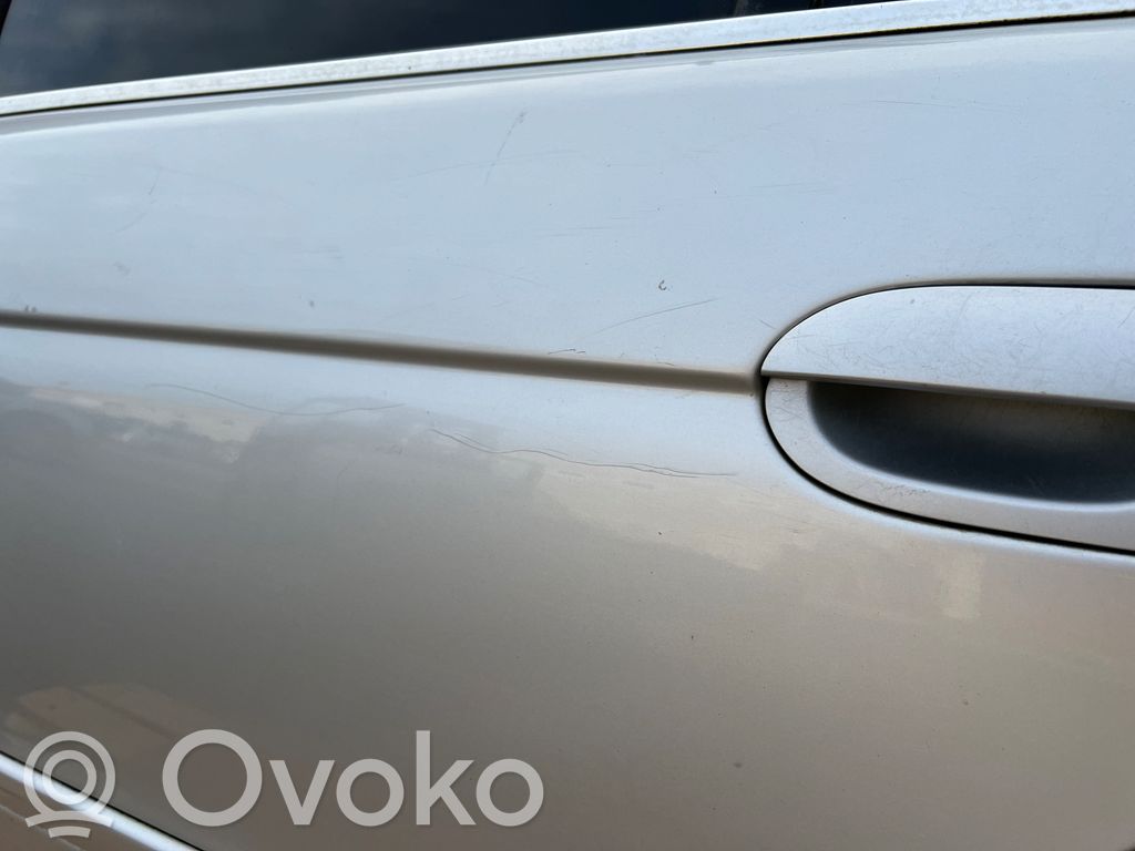 Aizmugurējās durvis