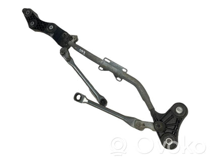 Stikla tīrītāja mehānisms (stienis)