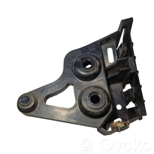 Rear bumper mounting bracket