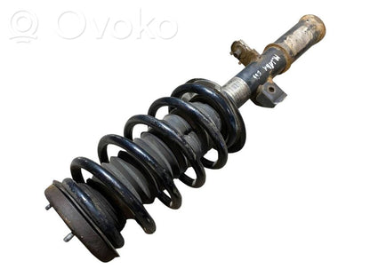 Priekšpusē amortizators ar atsperi