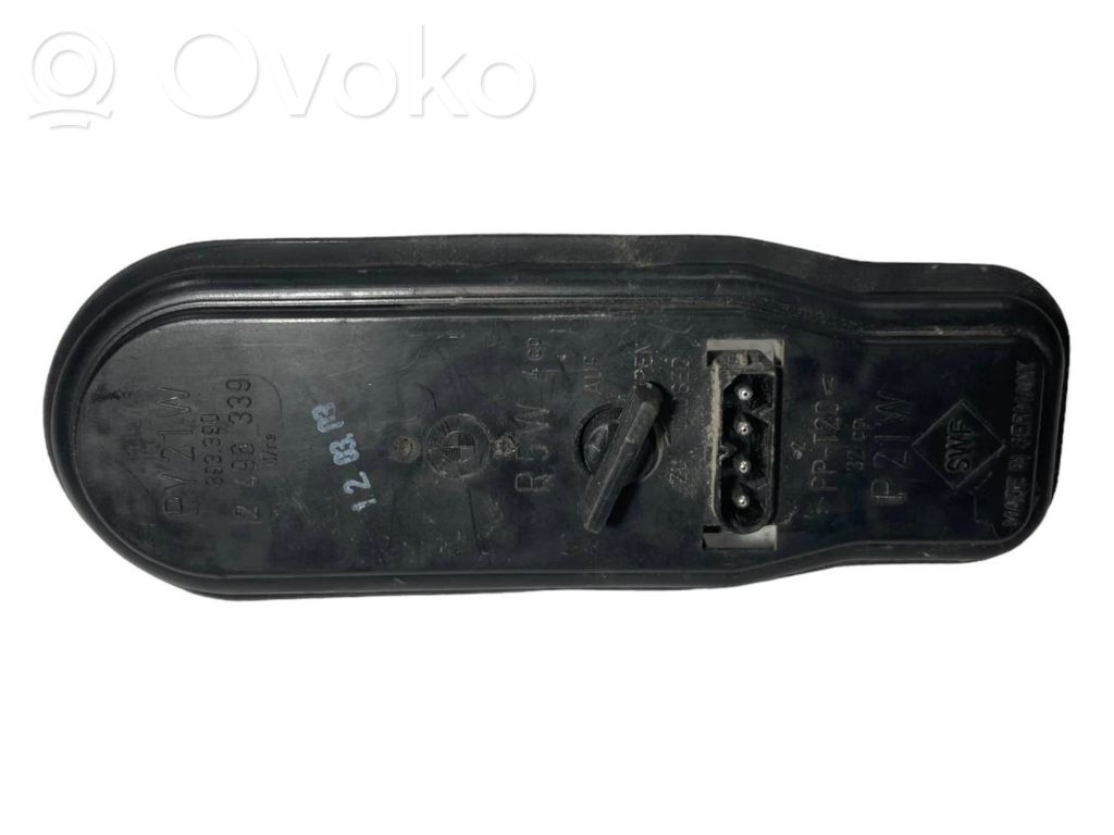 Aizmugures spuldzes vāka turētājs