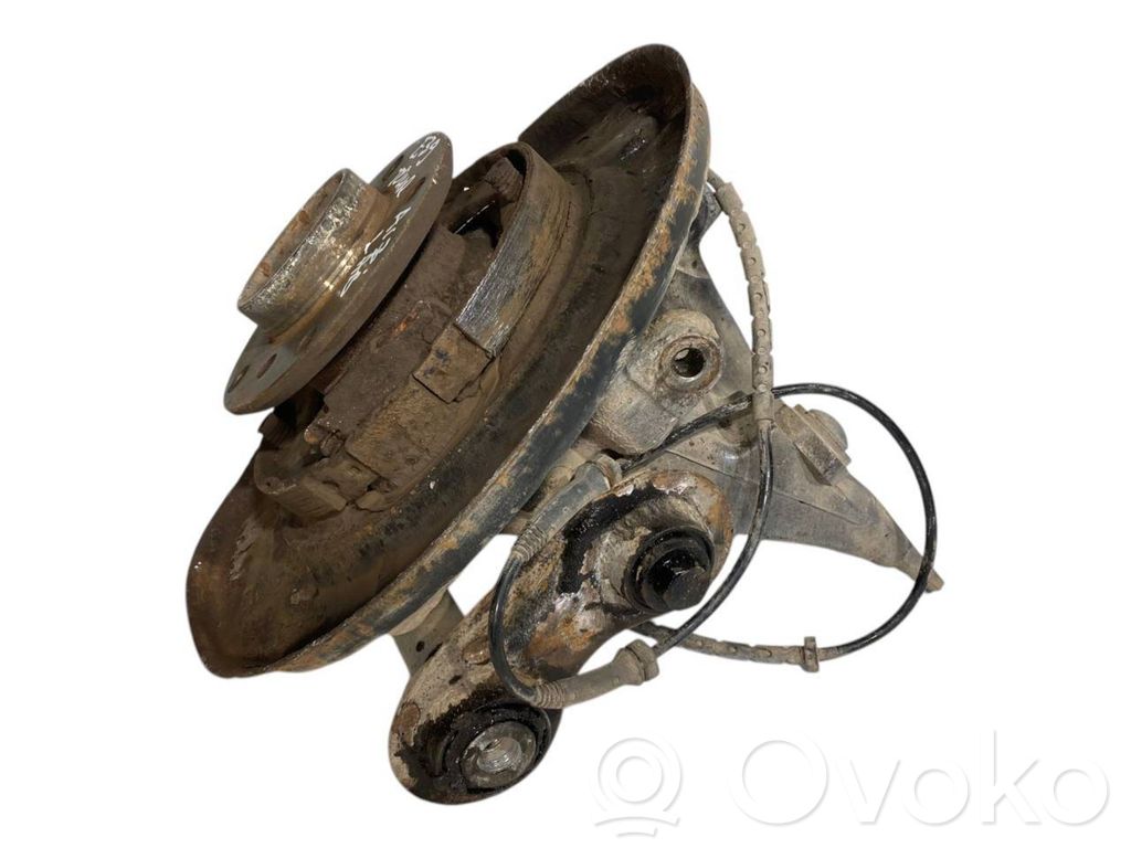 Aizmugurē riteņa rumbas vārpstas šarnīrs (stupica, capfa)