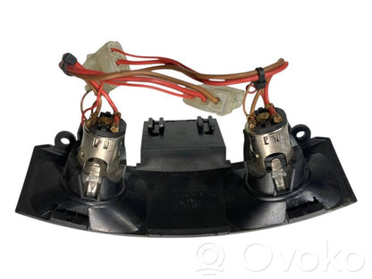 Cigarette lighter in the rear