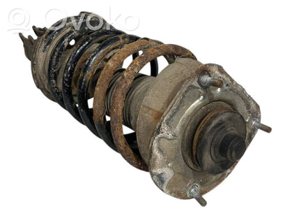 Priekšpusē amortizators ar atsperi