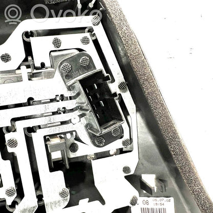 Aizmugures spuldzes vāka turētājs