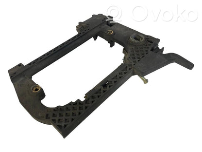 Holder/bracket for external opening handle at the front