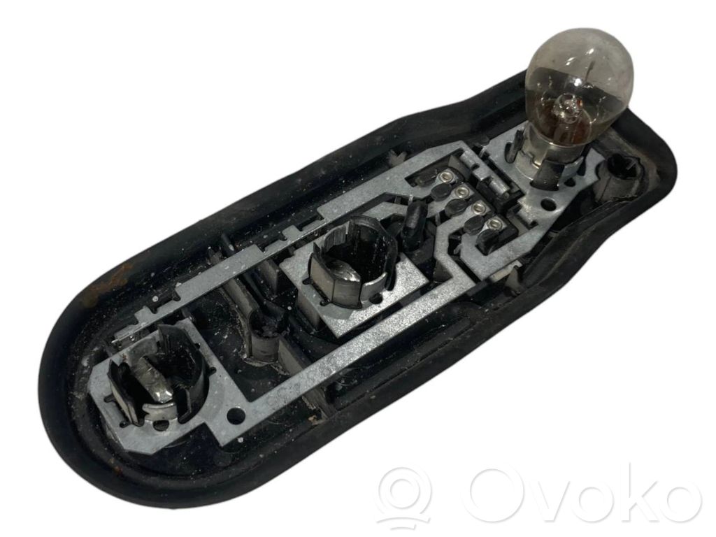 Aizmugures spuldzes vāka turētājs