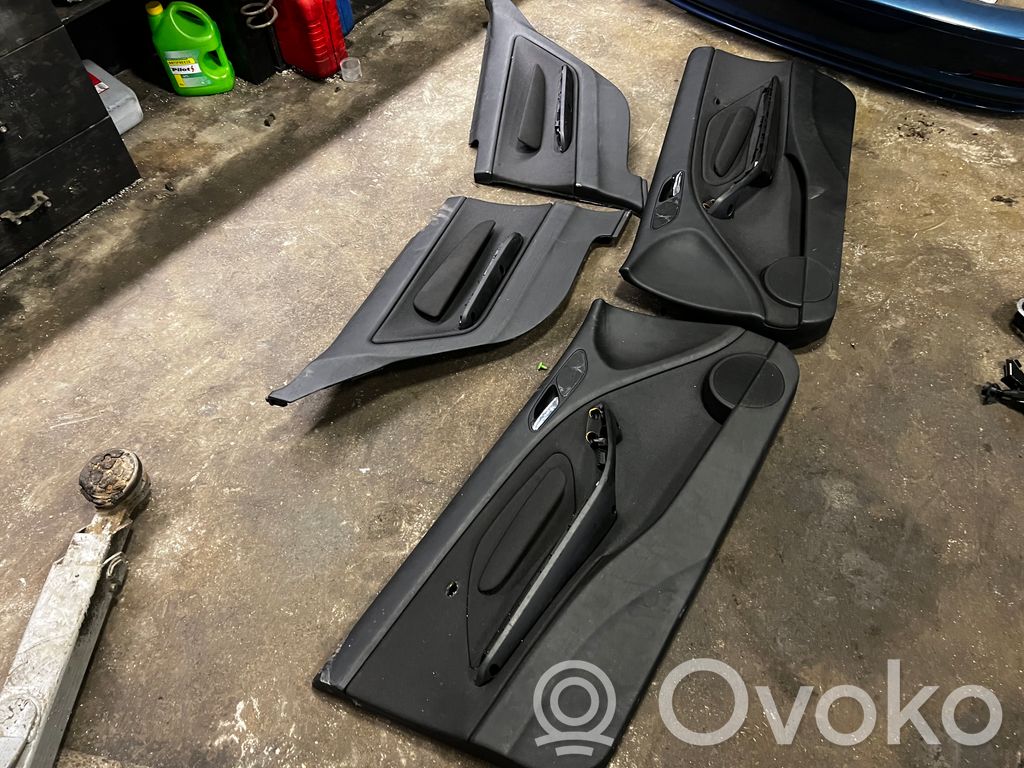 Coupe rear side trim panel