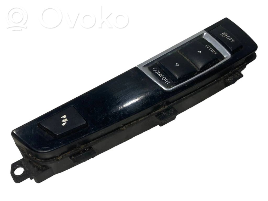 Šasijas aukstuma / stingruma regulēšanas slēdzis