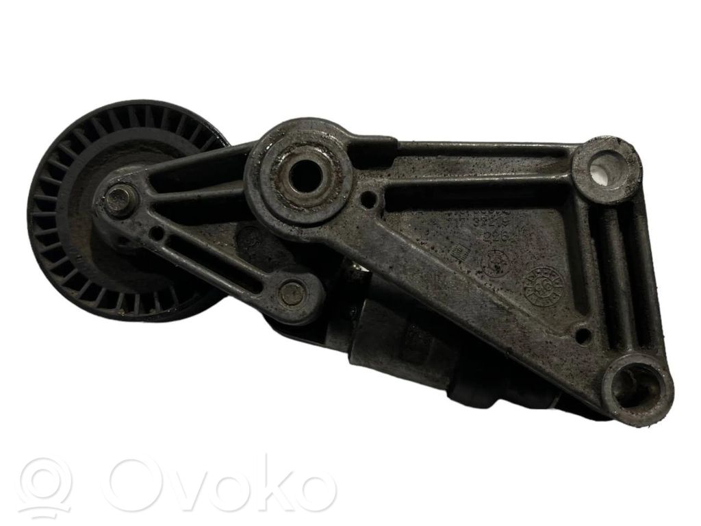 Alternator belt tensioner