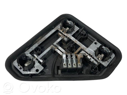 Aizmugures spuldzes vāka turētājs