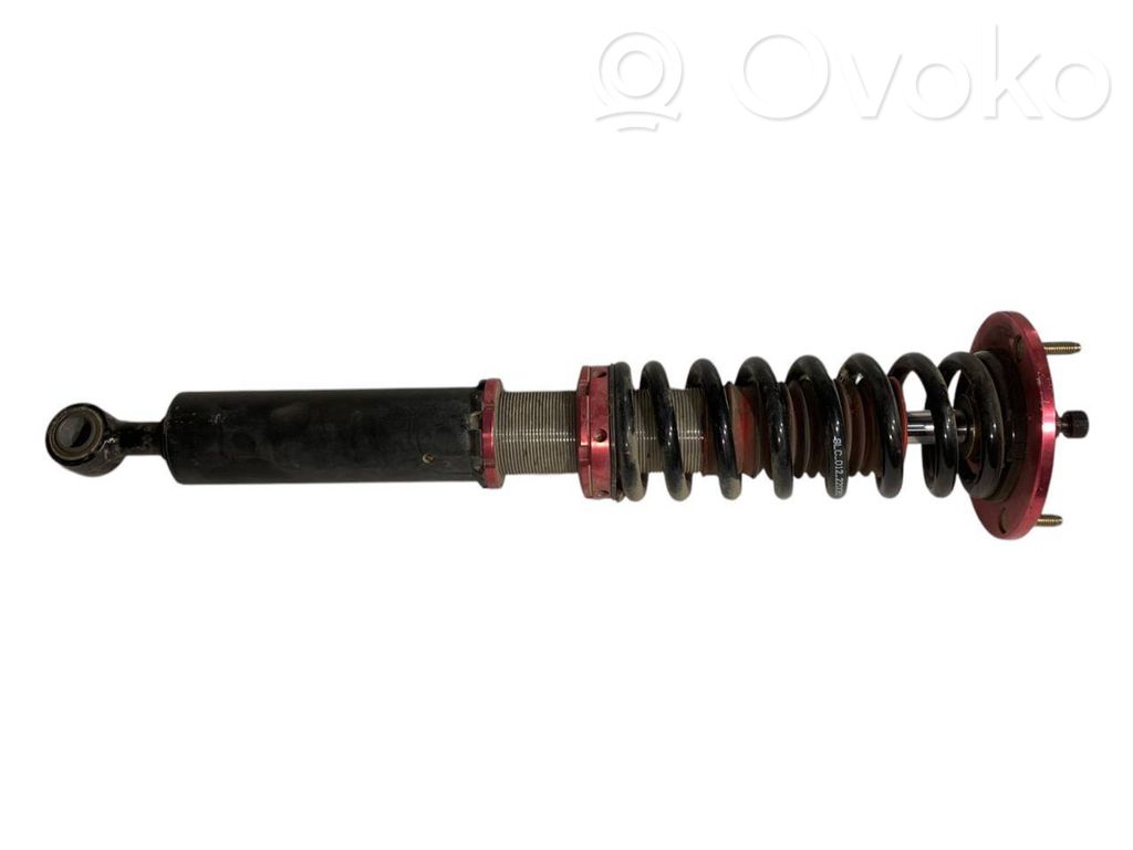 Rear shock absorber with spring