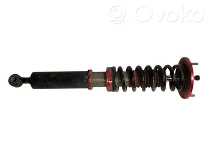 Rear shock absorber with spring
