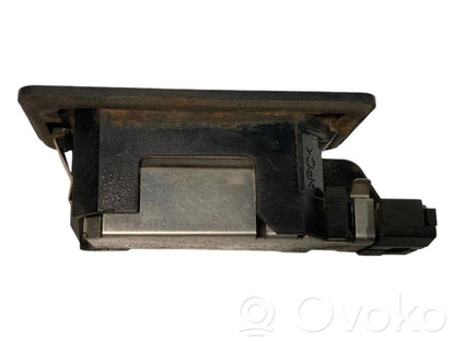 Освещение номерного знака