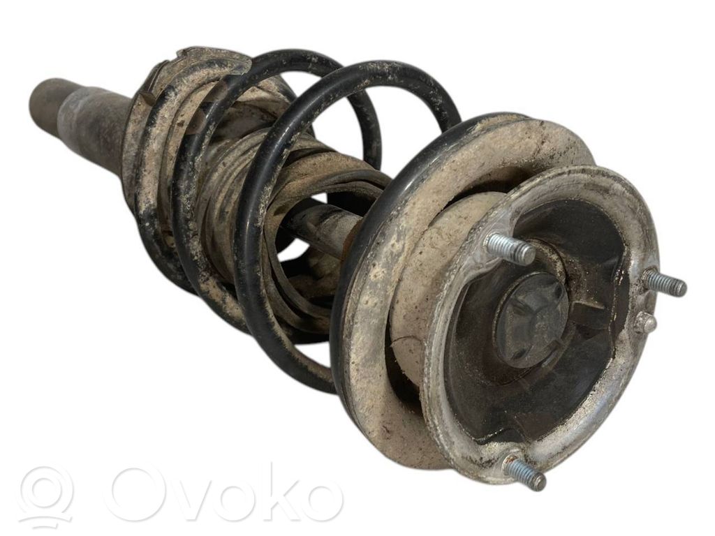 Priekšpusē amortizators ar atsperi