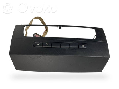 Sēdekļu apsildes slēdzis