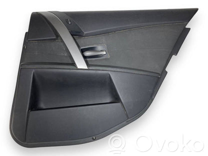 Apšuvums aizmugurējām durvīm