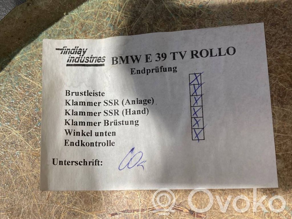 Aizmugurē logu aizkars