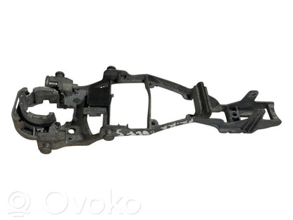 Priekšpusē turētājs / kronšteins ārējam atvēršanas rokturim