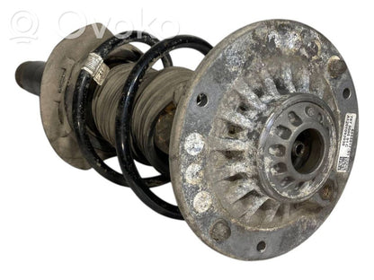 Front shock absorber with spring