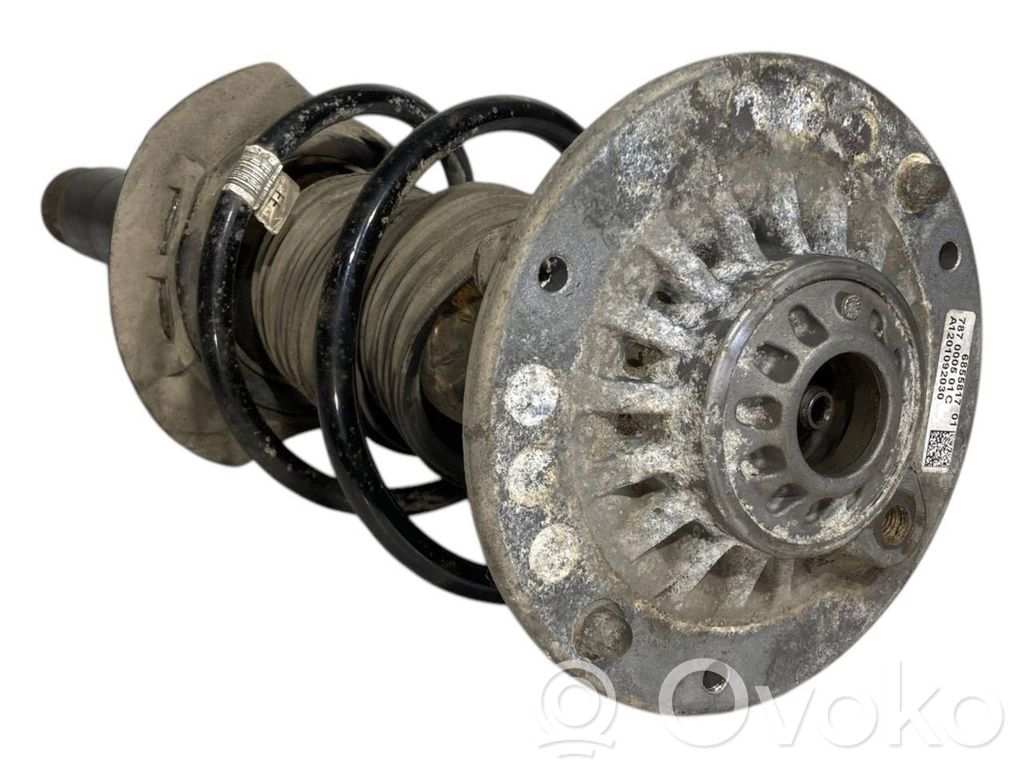 Priekšpusē amortizators ar atsperi