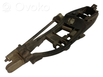 Holder/bracket for external opening handle at the front