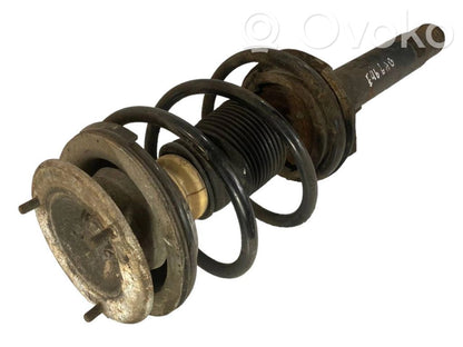 Priekšpusē amortizators ar atsperi