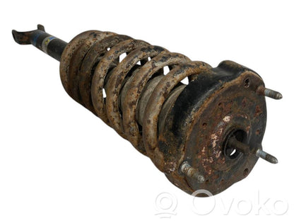 Priekšpusē amortizators ar atsperi