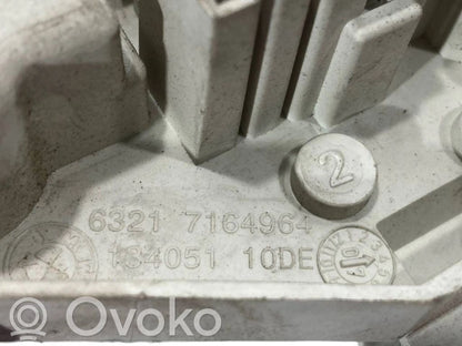 Aizmugures spuldzes vāka turētājs