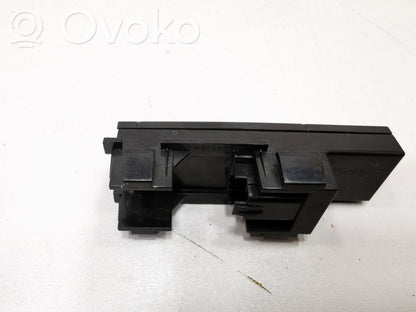 Glove box opening button