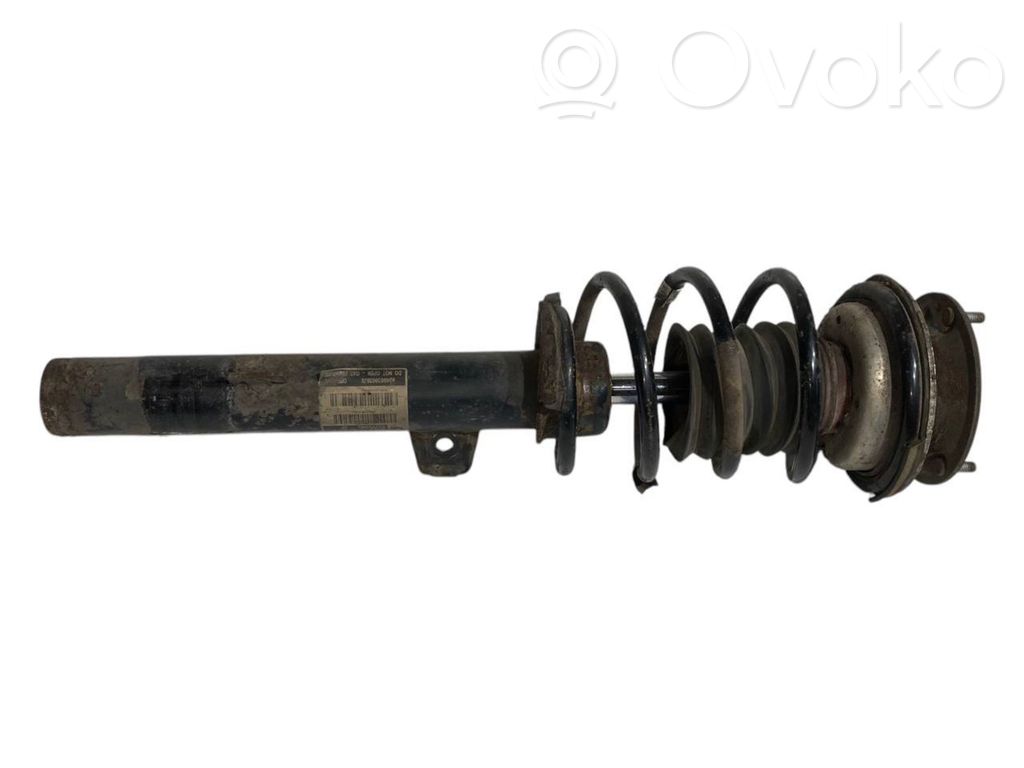 Priekšpusē amortizators ar atsperi