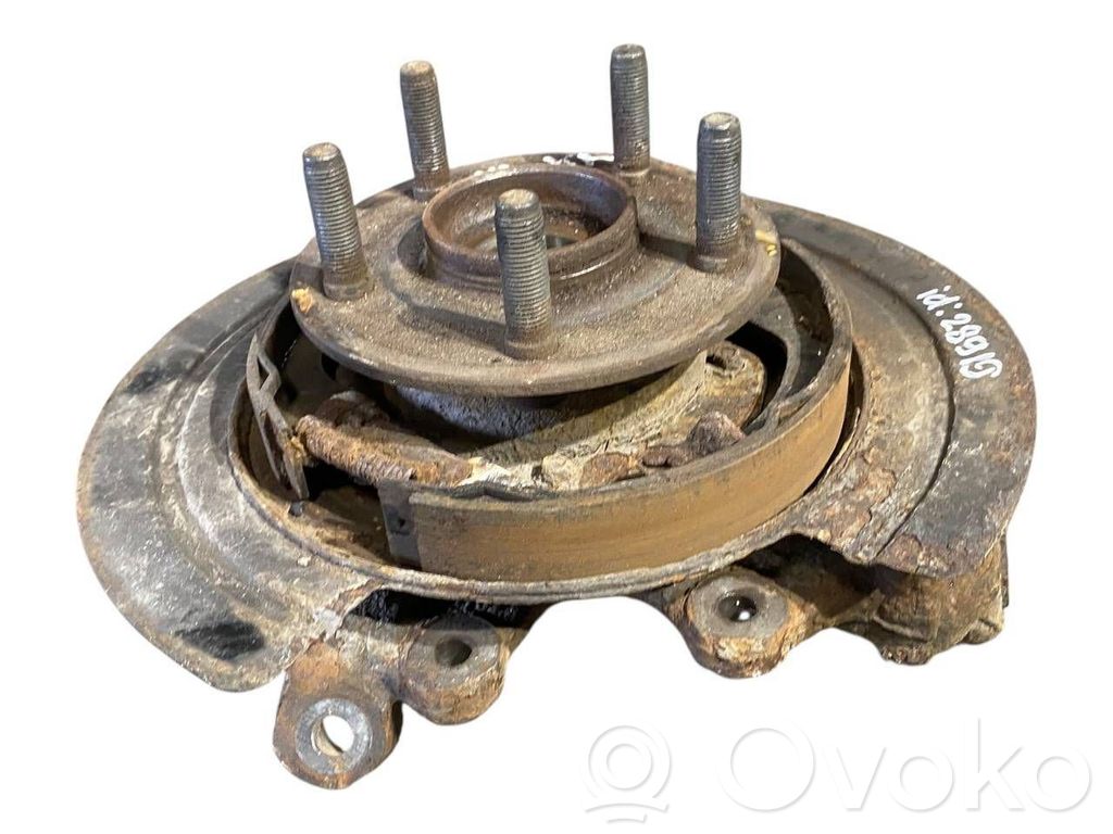 Aizmugurē riteņa rumbas vārpstas šarnīrs (stupica, capfa)