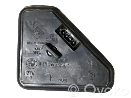 Aizmugures spuldzes vāka turētājs