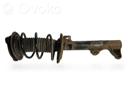 Priekšpusē amortizators ar atsperi