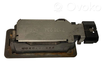 Освещение номерного знака