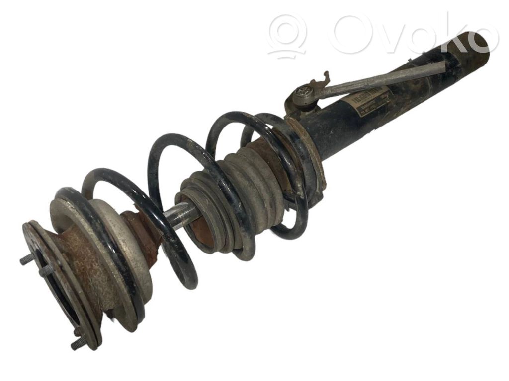 Priekšpusē amortizators ar atsperi