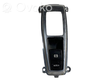 Rokas bremzes slēdzis