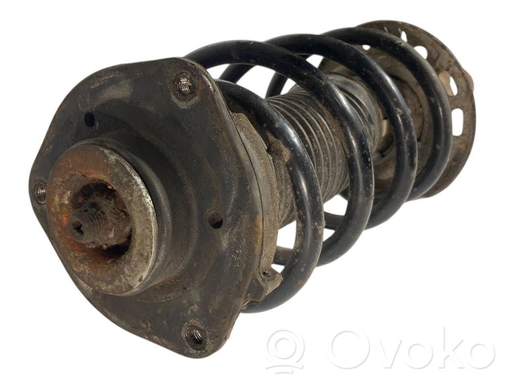 Priekšpusē amortizators ar atsperi