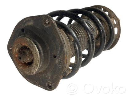 Priekšpusē amortizators ar atsperi