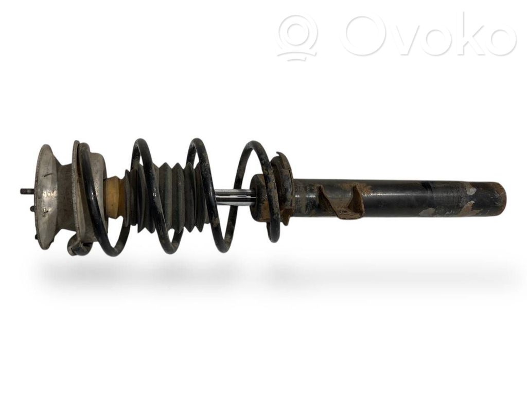 Priekšpusē amortizators ar atsperi