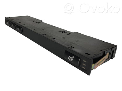 Sēdekļu apsildes slēdzis