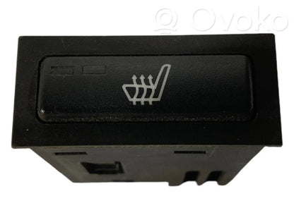 Sēdekļu apsildes slēdzis