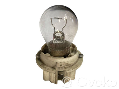 Aizmugures spuldzes vāka turētājs